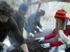 Mixing woodchips for mushrooms